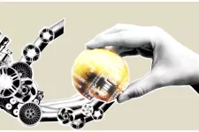 Robot hand and human hand gripping an apple